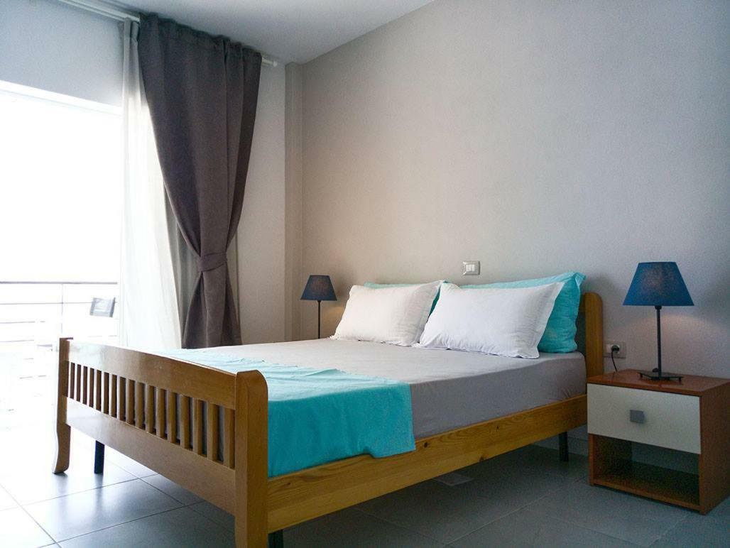 Sunset Boulevard Hotel Qeparo Luaran gambar